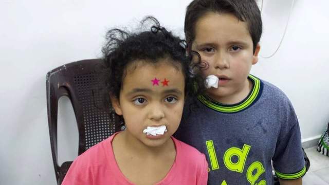 2581232_web1_Refugee-dentist-3-12-04-15.jpg