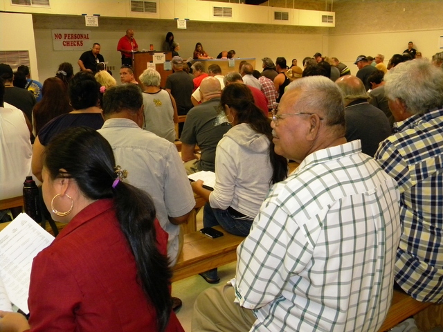 2775639_web1_auction-crowd.jpg