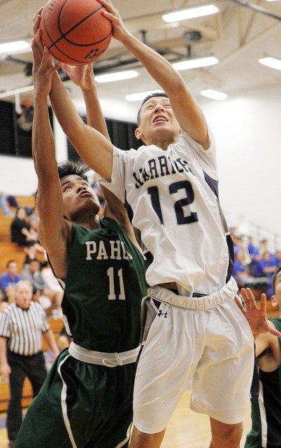 2785519_web1_pahoa-vs-waiakea-02-b-ballPahoa-W.jpg