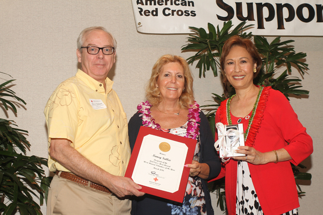 3176344_web1_Steve-Tabussi--First-Insurance-Company-of-Hawaii--Nancy-Sallee--Kona-Volunteer-of-the-Year--Coralie-Matayoshi--Red-Cross-.jpg