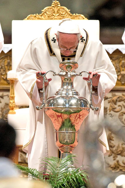 5211062_web1_Vatican-Pope-Chrism_Cart.jpg