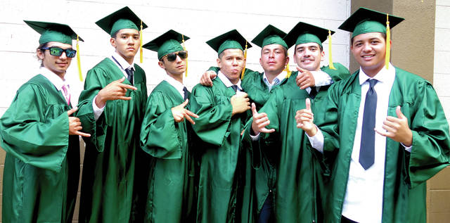 5385729_web1_Afffectionately-known-as-the-senior-class-clowns-seven-graduates-wait-Saturday-to-enter-Honokaa-County-Parks--Recreation-Gymnasium-right-before-the-ceremony..jpg