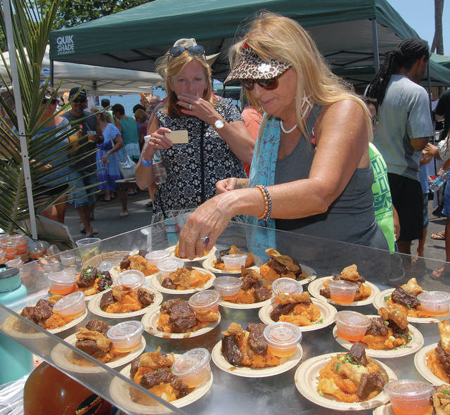 Tropical tipples, tasty food draws crowd to 9th annual Don the