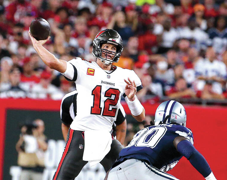 Tampa Bay Buccaneers wide receiver Antonio Brown (81) runs after catching a  pass during the first half of an NFL football game against the Dallas  Cowboys, Thursday, Sept. 9, 2021, in Tampa