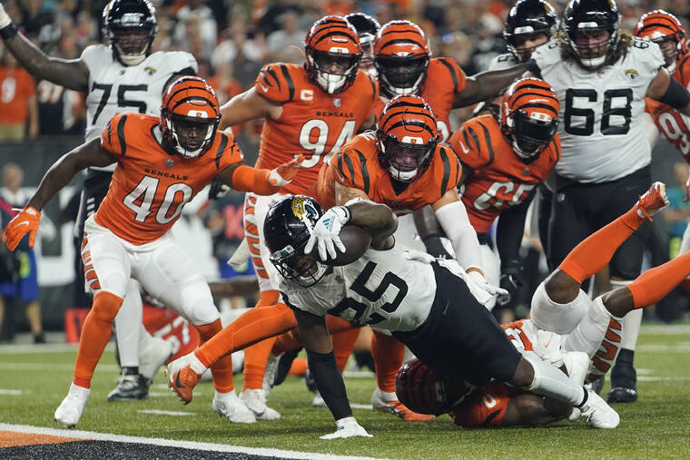 Bengals look for momentum against Meyer, winless Jaguars