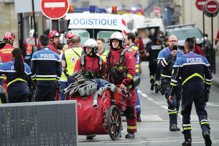 Paris police look at gas leak as possible cause of explosion and fire ...