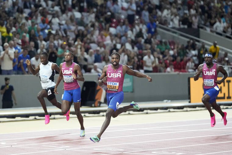 Lyles wins 200meter world title and looks to a star at next