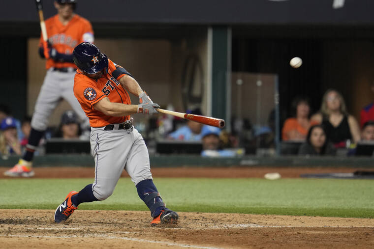 Manny Ramirez takes a big swing and connects for a home run in the fourth  inning.